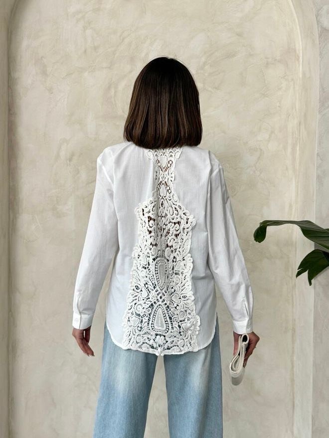 witte blouse